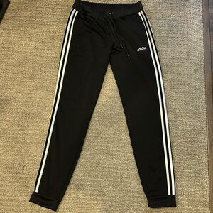 Black Adidas track pants like new.
